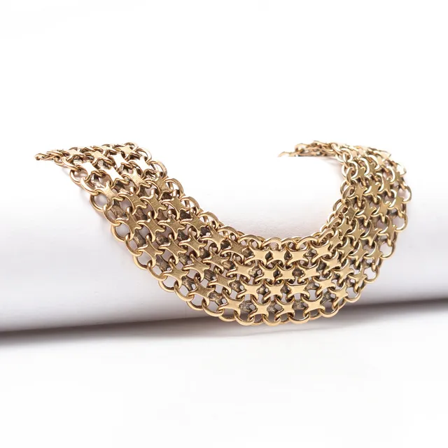 ARMBAND, x-länk, 18k guld, vikt ca 26,9 gram.