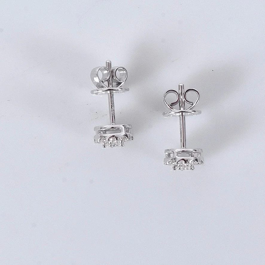 DIAMANTÖRHÄNGEN, ett par, totalt 0,42ct, vitguld, 18K. — Earrings — Halmstads Auktionskammare