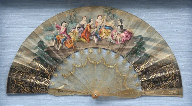 Elizabethan fan with horn sticks and lithographed and painted paper leaves, circa 1860.
