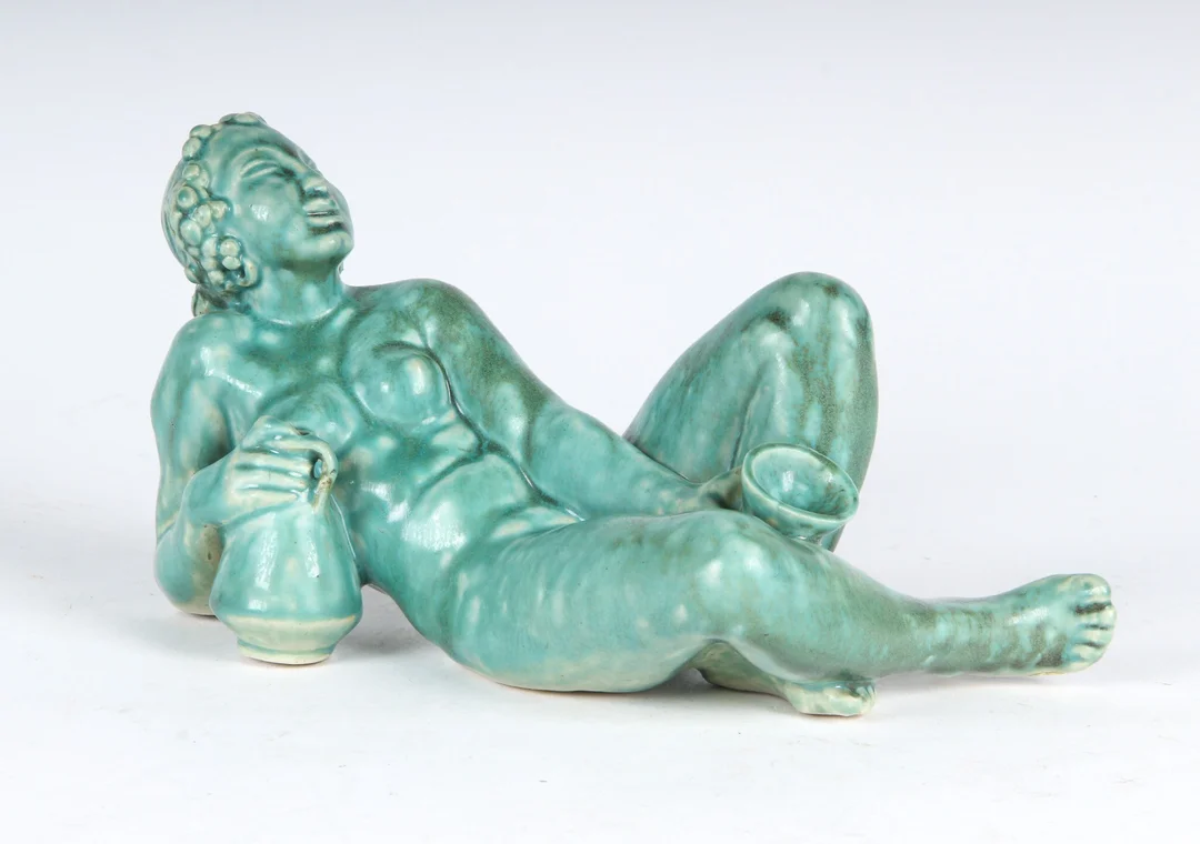 Jens Jacob Bregnø. Bacchante, figure of green-glazed stoneware, circa 1930s. — Glass, porcelain and ceramics/Figures — Lauritz