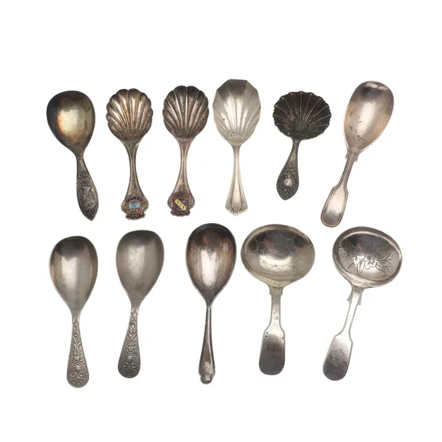 COLLECTION OF SILVER PLATED CADDY SPOONS.