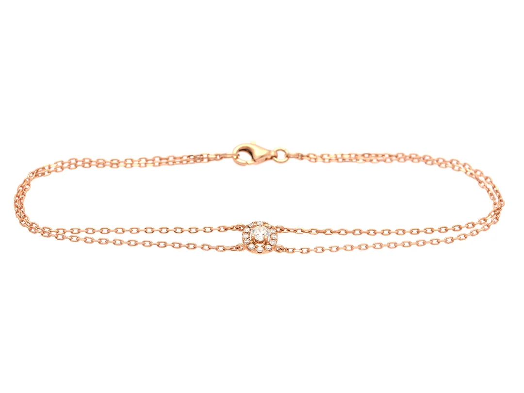 ARMBAND, 18K roséguld, briljantslipade diamanter ca 0,30 ctv, ca TW-W/VS-SI, längd 19 cm, vikt 2,5 g. — Smycken/Armband — Kaplans