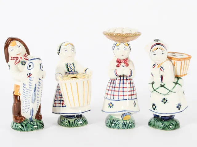 Herluf Jensenius for Aluminia. Four children's aid day figurines made of faience (4)