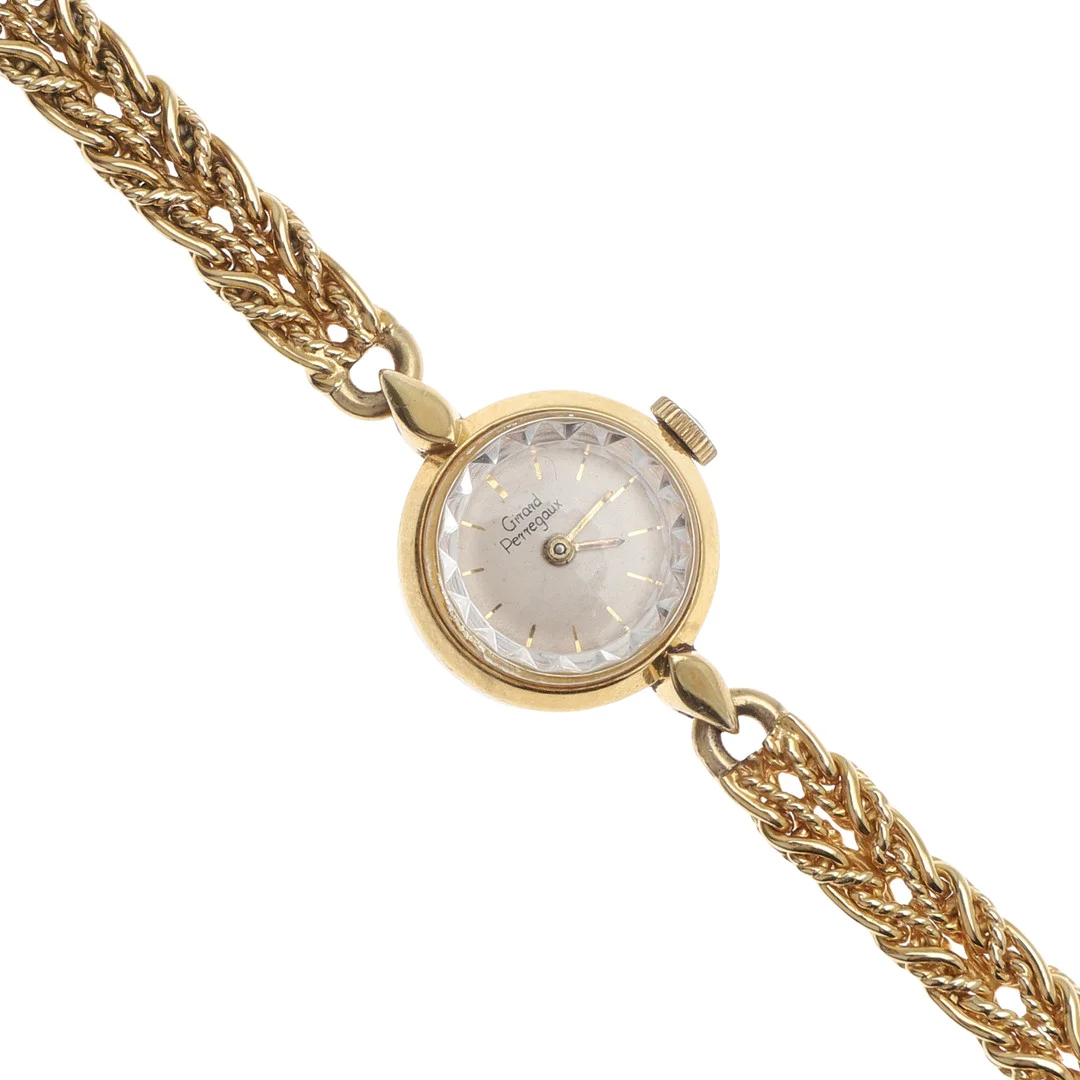 A LADY'S 18CT GOLD WRISTWATCH BY GIRARD PERREGAUX. — Wristwatches — Lawrences Auctioneers