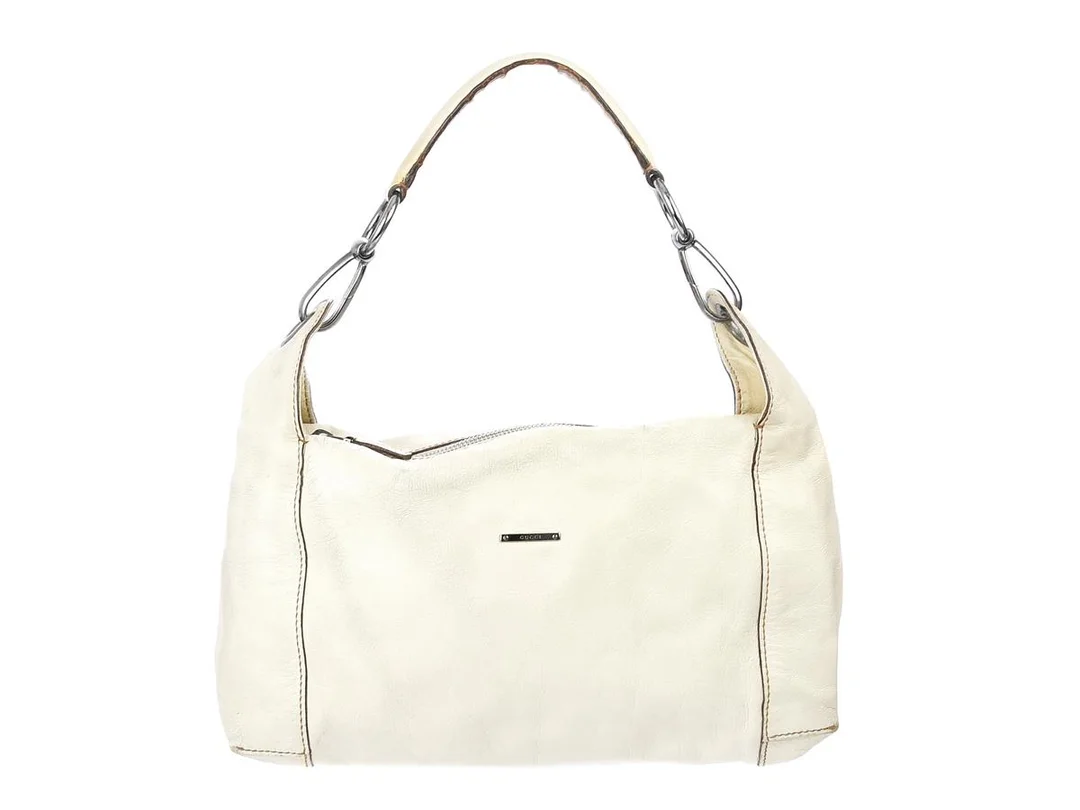 VÄSKA, GUCCI, vintage, vitt skinn, silverfärgade beslag, 31x21x9 cm, dustbag, fläckar, slitage. — Accessoarer/Väskor — Kaplans