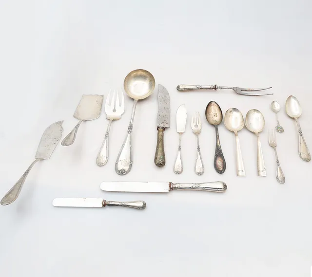 TWELVE-SIDED silver cutlery, from the second third of the 20th century.