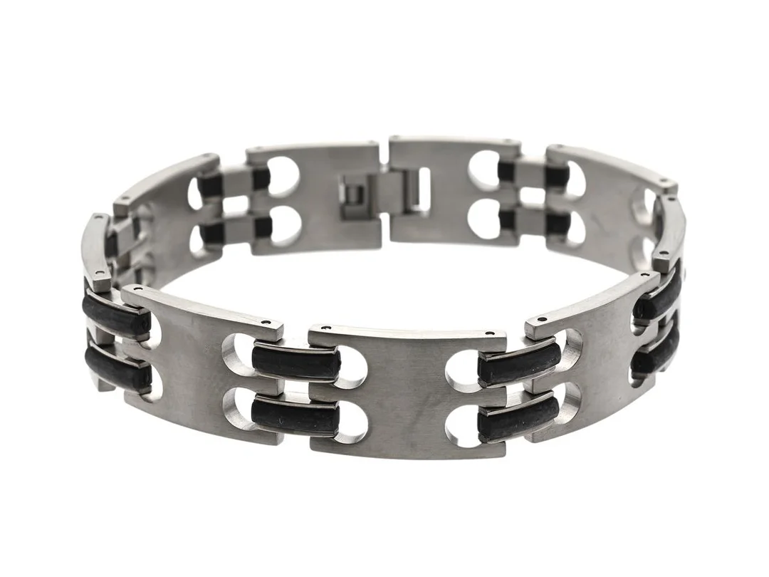 ARMBAND, stål och svart plast, fantasilänk, längd 21 cm, vikt 41,2 g. — Smycken/Armband — Kaplans