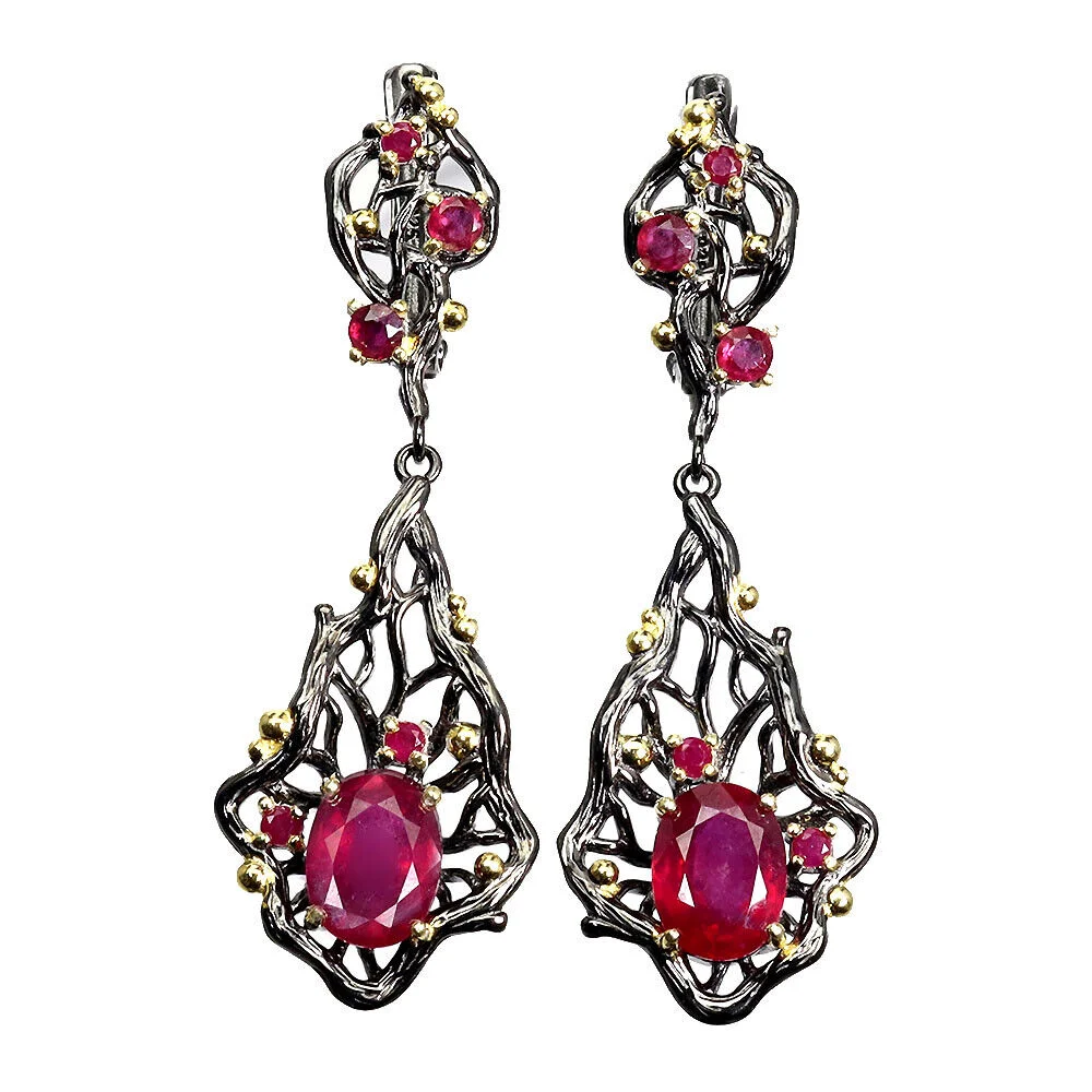 Earrings in black rhodium-plated Sterling silver with two larger rubies and numerous smaller rubies — Jewellery/Earrings — Lauritz