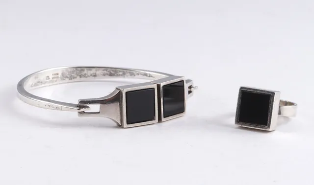 N. E. From. Sterling silver and black onyx bangle and ring (2)