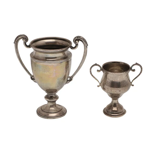 TWO SMALL TWIN HANDLED SILVER TROPHY CUPS.