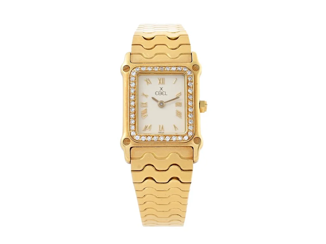 EBEL, Sport Classic, Cal 66, Boett nr. 48 / 866915, damur, 18,5 x 21 (27,5) mm, 18K guld, quartz, safirglas, briljantkrans (40 st. TW-W/VS), integrerad originallänk, längd 150 mm, totalvikt 57,9 gram, ca 1990. — Klockor/Ebel — Kaplans