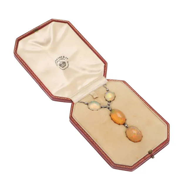 AN OPAL AND DIAMOND PENDANT.