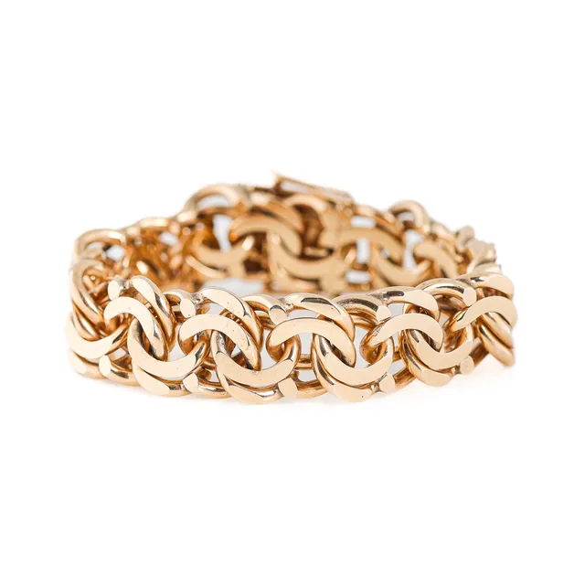 Aage Albing: A heavy bracelet of 14k gold. Weight 83.3 g. Length 19 cm. 1970s.