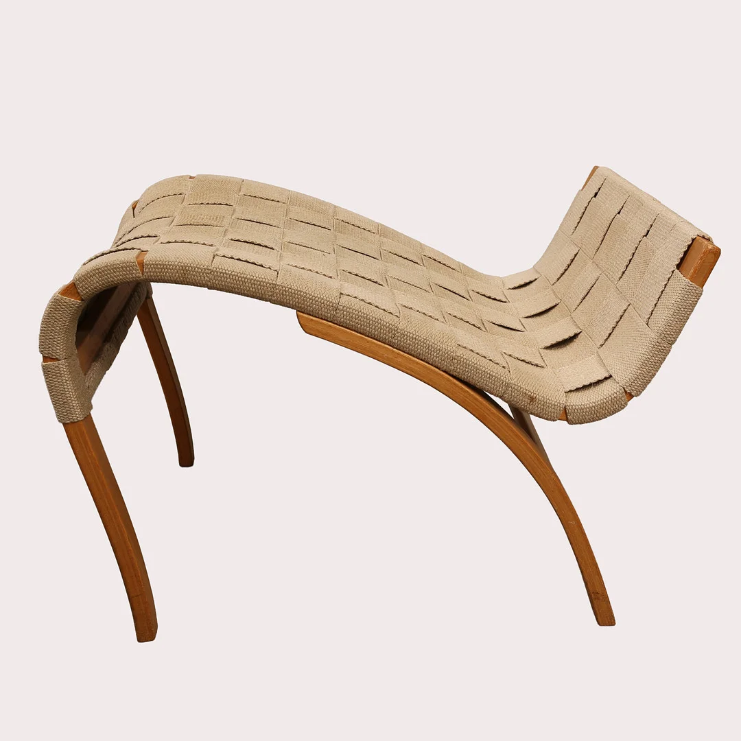 BRUNO MATHSSON. Fotpall, bok med flätad sadelgjord, "Pernilla", Dux, 1900- talets fjärde kvartal. — Armchairs & Chairs — Limhamns Auktionsbyrå
