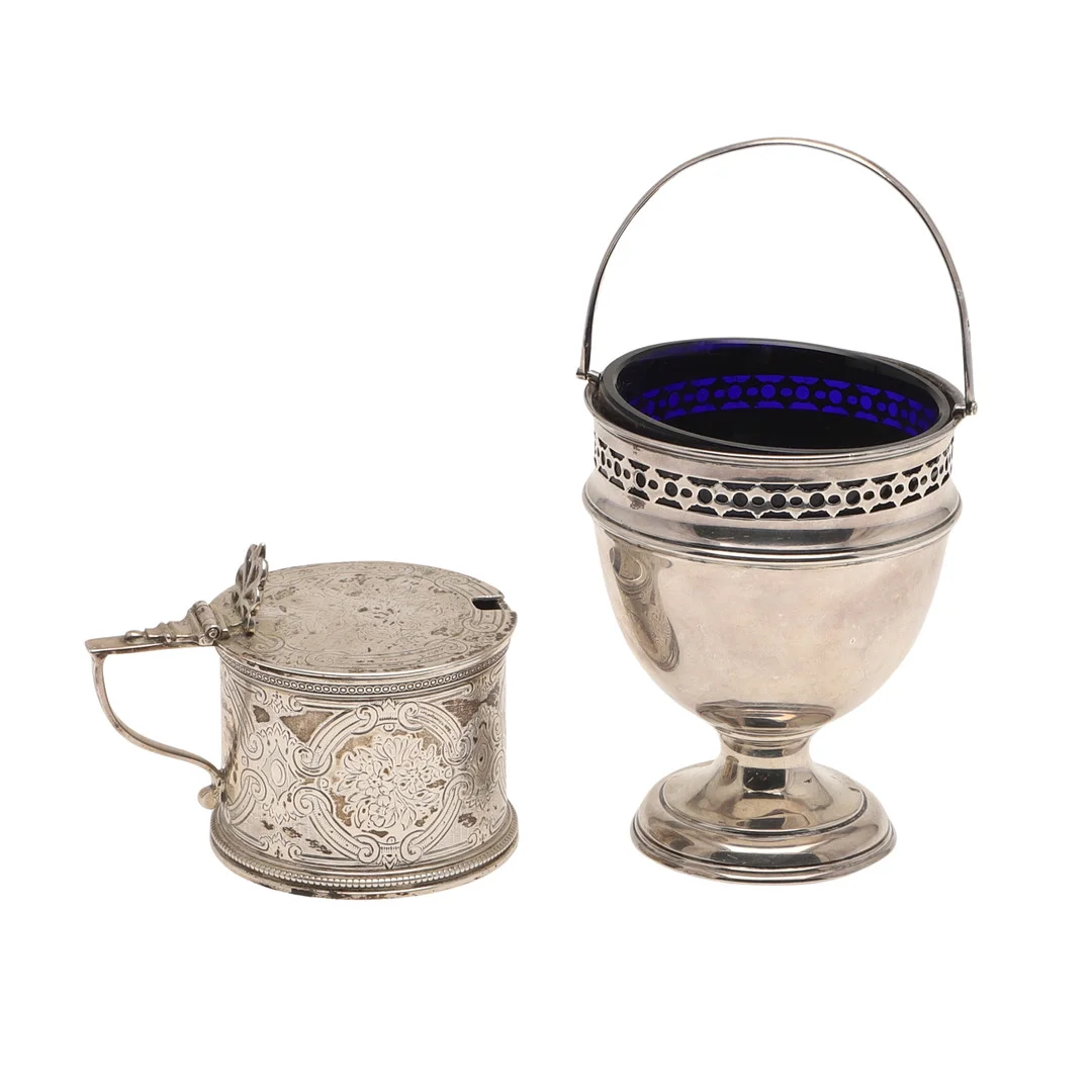A VICTORIAN SILVER MUSTARD POT AND AN EARLY 20TH CENTURY SUGAR BASKET. — Silver — Lawrences Auctioneers