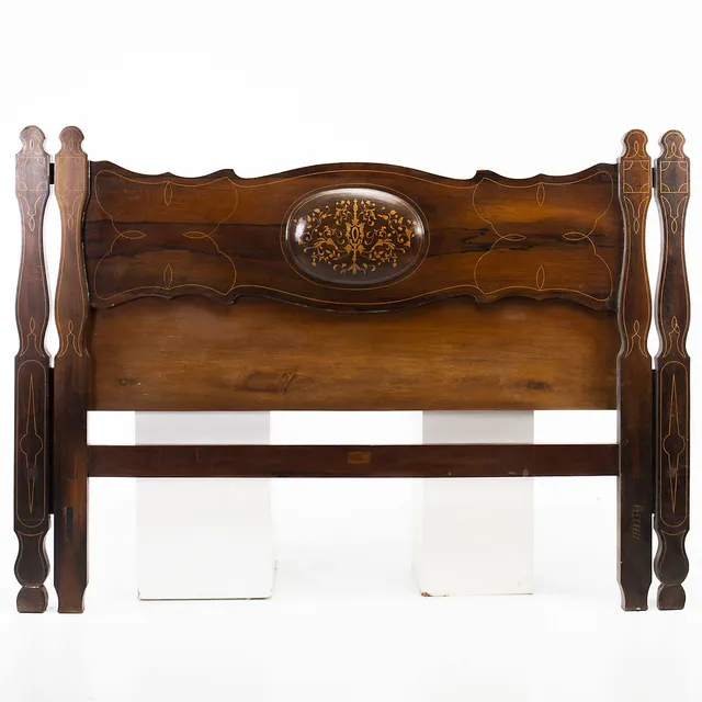 Elizabethan bedhead in jacaranda and mahogany with boxwood marquetry.