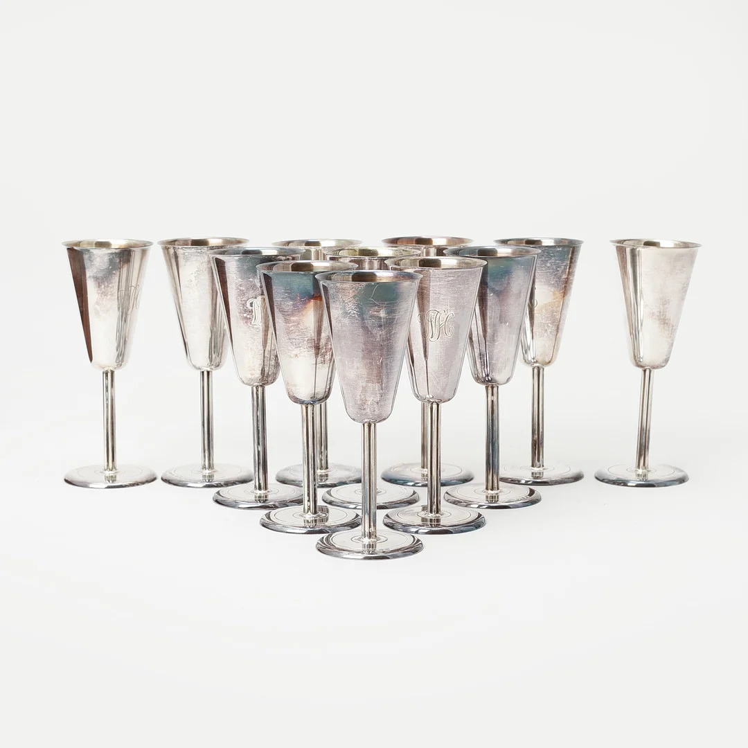 SPETSGLAS, 12 st, silver, ca 560 gram, C.G. Hallberg, Stockholm, 1953. — Silver — Göteborgs Auktionsverk