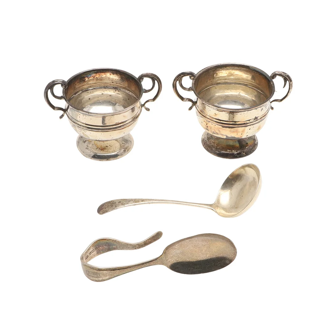 A PAIR OF EDWARDIAN SILVER SALTS OF TROPHY FORM, AND TWO SILVER SPOONS. — Silver — Lawrences Auctioneers