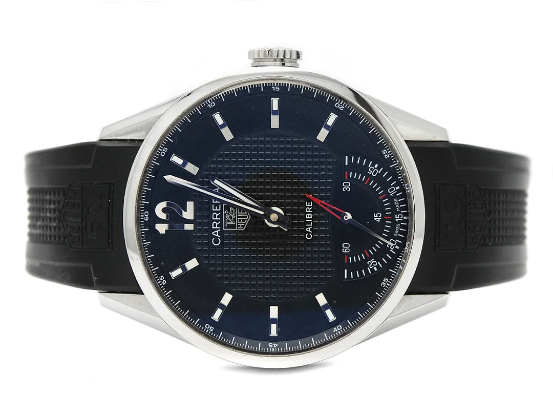 TAG HEUER, Carrera, Calibre 1, Serie nr. 1244/6000, Ref nr. WV3010.EB0025, Boett nr. WV3010, herrur, 42 mm, stål, manuell, safirglas, datum, liten sekundvisare, glasbaksida, gummiband, viklås, Ref nr. FC 5036-FS5, läderband, viklås, cert, oktober 2008, box, ytterkartong. Limiterad och numrerad (Nr. 1244/6000). — Klockor/Tag Heuer — Kaplans
