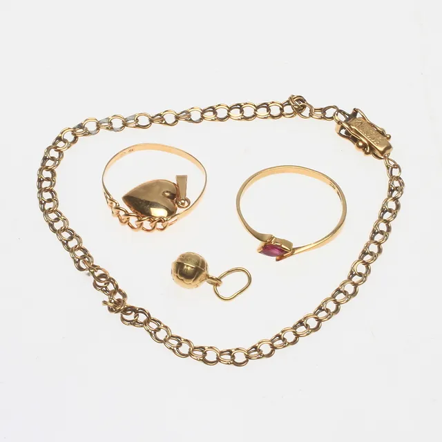 GULDSMYCKEN, 18k guld, vikt ca 6,6 gr.