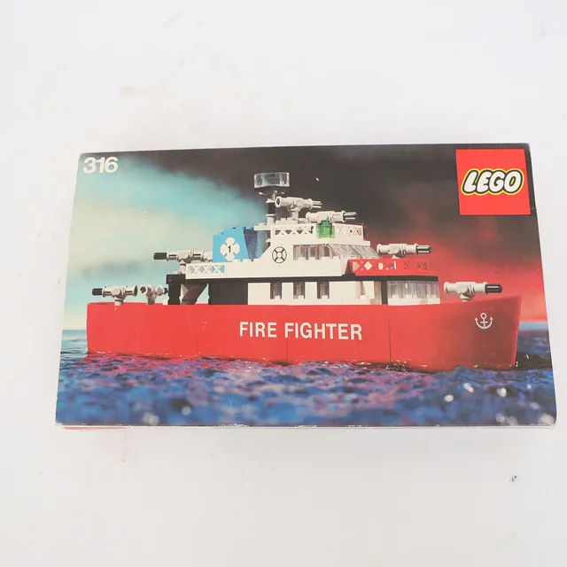 LEGO, "Fire fighter" Nummer 316, i originalförpackning.