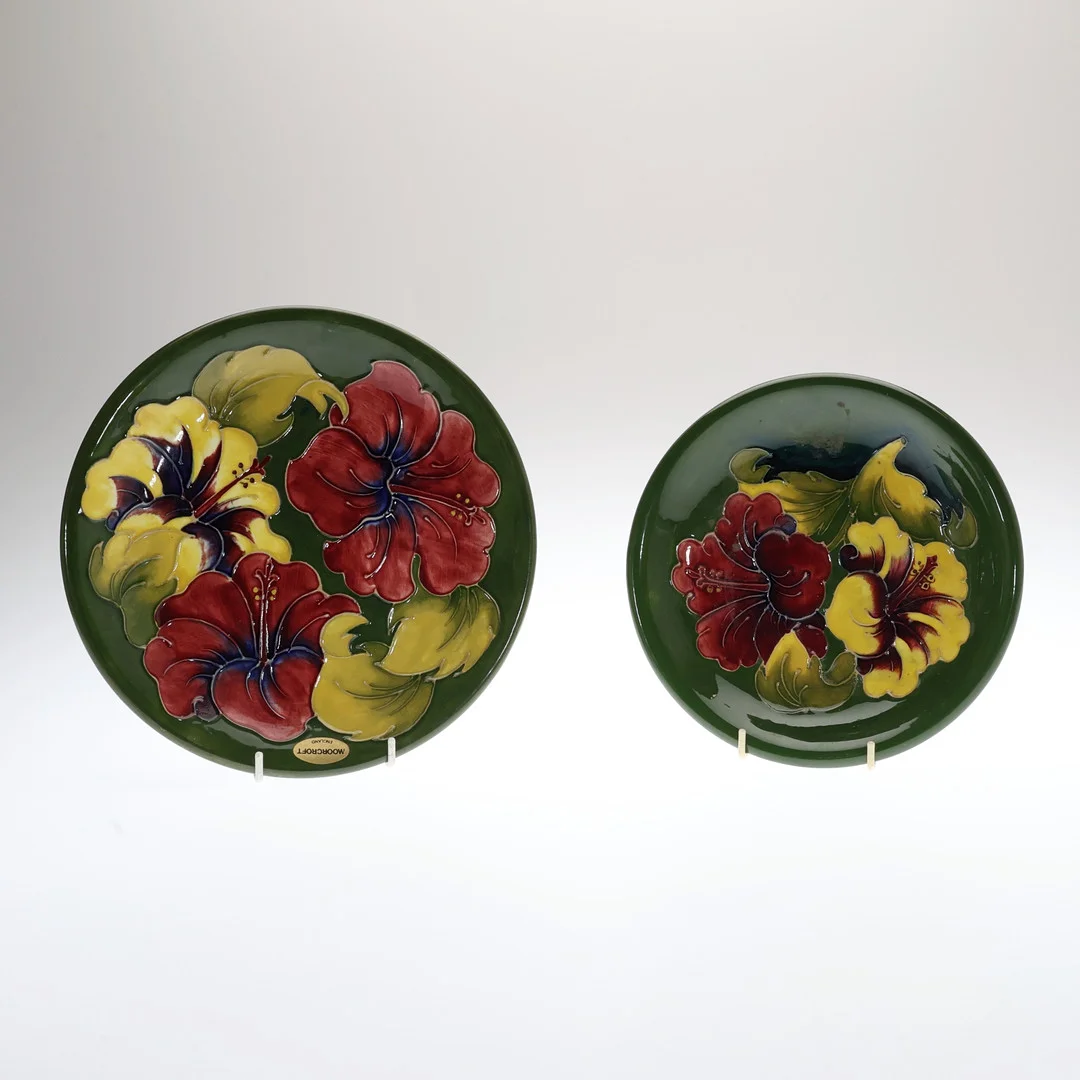 2 WALTER MOORCROFT HIBISCUS PATTERN PLATES. — European — Young's Auctions
