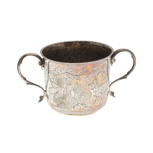 A GEORGE V SILVER TWIN HANDLED CHRISTENING CUP.