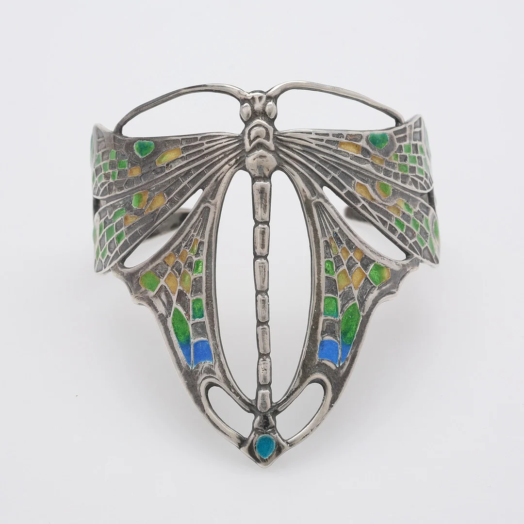 ARMBAND, SILVER & PLIQUE-À-JOUR, I FORM AV TROLLSLÄNDA, 1900-TALETS FÖRSTA HÄLFT. — Silver — Crafoord Auktioner Lund