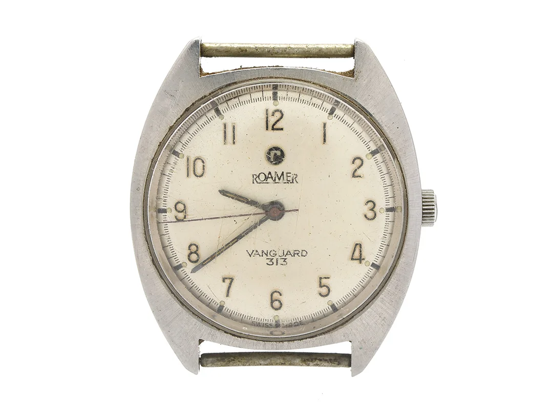 ROAMER, Vanguard 313, Cal MST 801, Boett nr. 801.2120.313, herrur, 34 mm, stål, manuell, plexiglas, skadad urtavla, ca 1970. — Klockor/Roamer — Kaplans