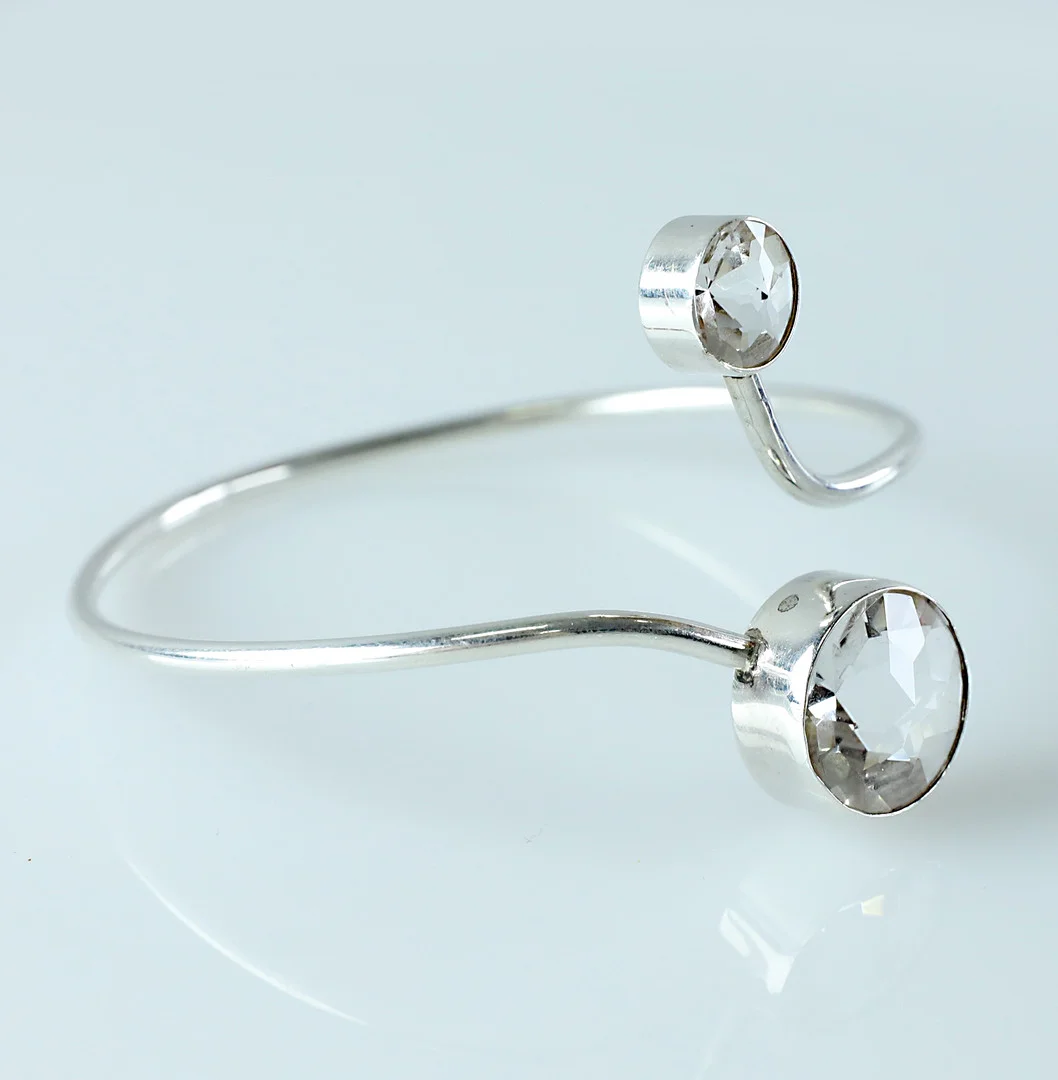 ISAAC COHEN. armring, silver och bergkristall, Stockholm, 1968. — Bracelets — Hälsinglands Auktionsverk