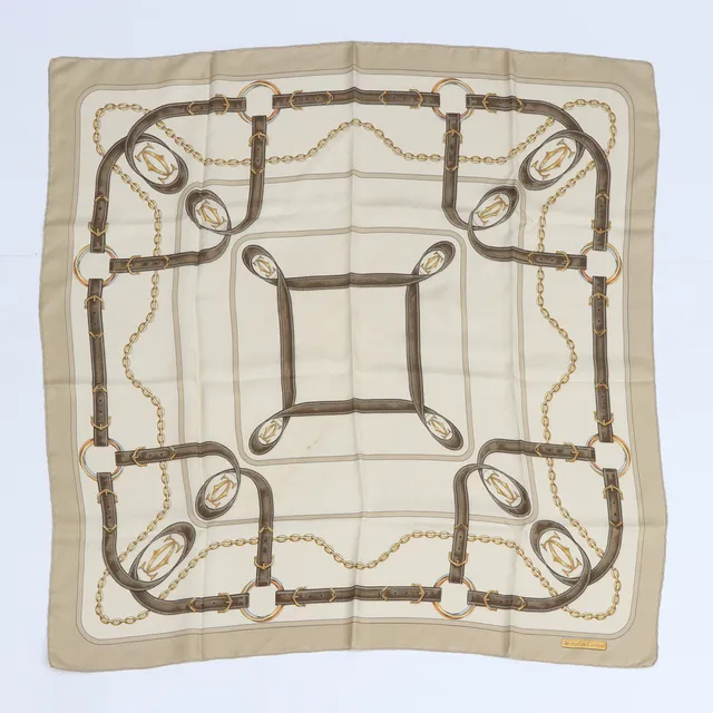 CARTIER, SCARF. Siden, motiv av läderremmar och guldlänkar.