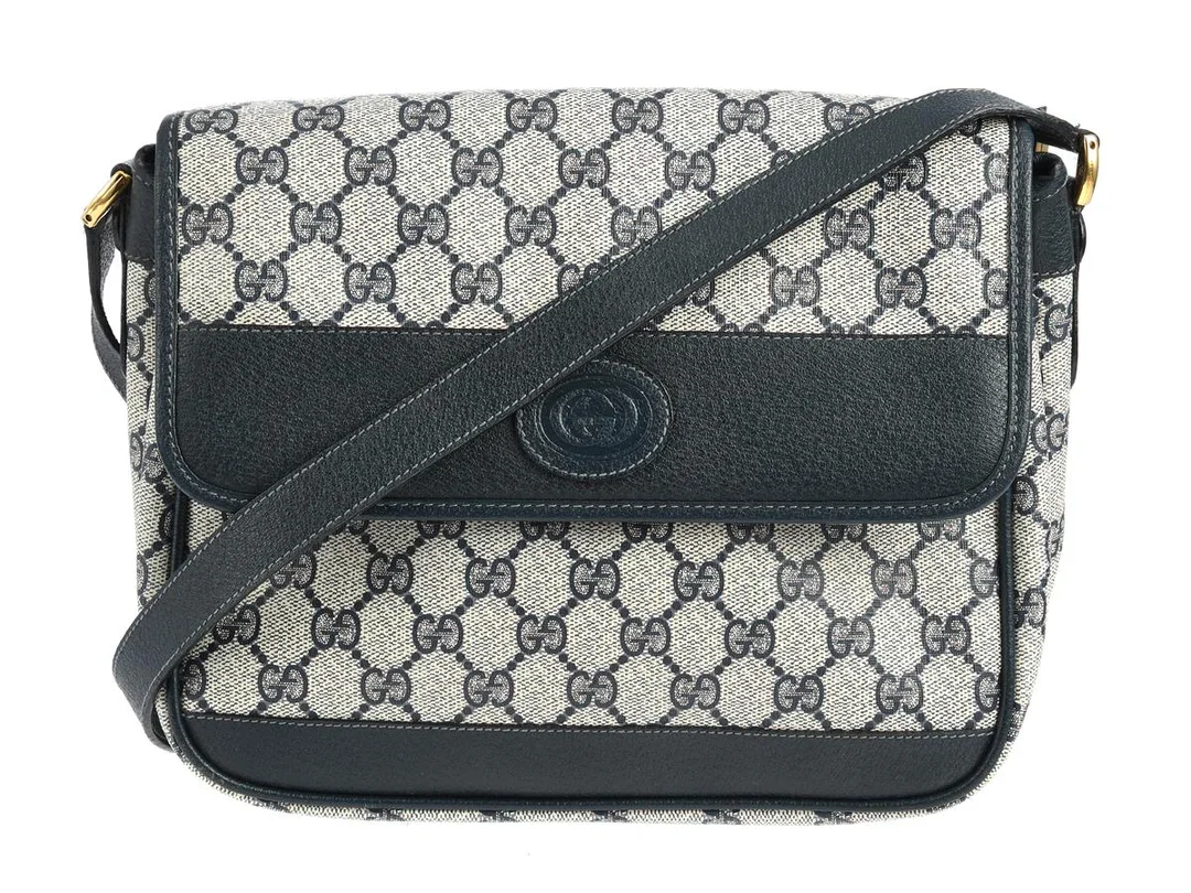 VÄSKA, GUCCI, vintage, GG supreme canavs, blått läder, guldfärgade beslag, 25x21x9 cm, dustbag, slitage på foder, bruksslitage. — Accessoarer/Väskor — Kaplans