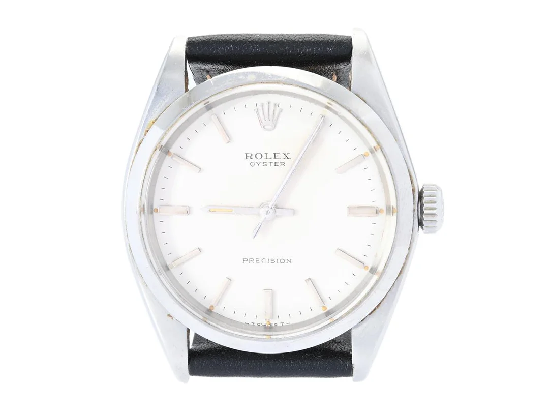 ROLEX, Oyster, Precision (-T Swiss T-), Ref nr. 6427, Serie nr. 3021351, Cal 1225, Boett nr. 6426, herrur, 34 mm, stål, manuell, plexiglas, skadad urtavla, defekt (går ej, akut servicebehov), läderband, ca 1971. — Klockor/Rolex — Kaplans