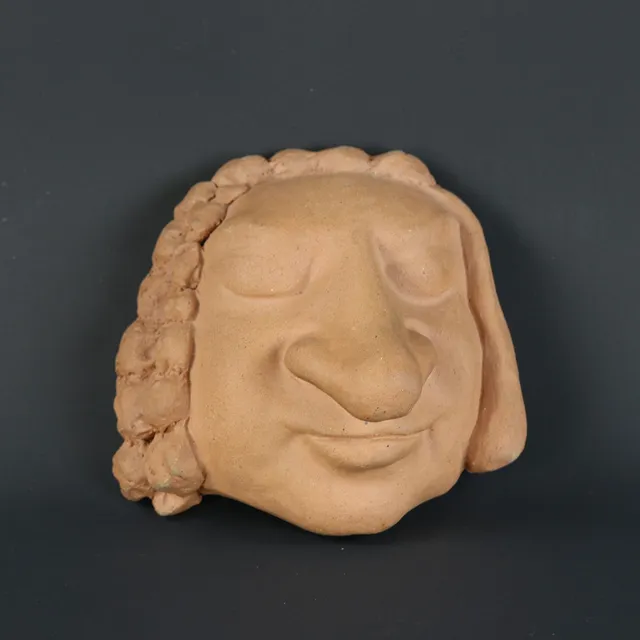 ÅKE HOLM. Skulptur, man med stor näsa, oglaserat stengods, signerad.