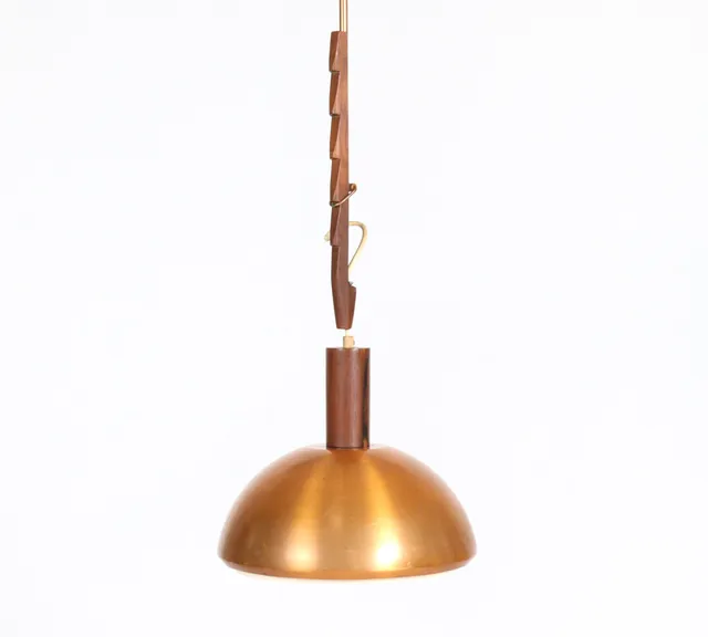 Svend Aage Holm Sørensen. Pendant lamp with copper shade, rosewood mounting. 1960s