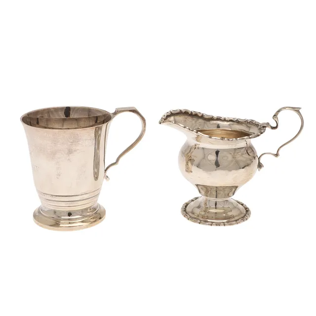 A SILVER CHRISTENING CUP AND A SILVER CREAM JUG.