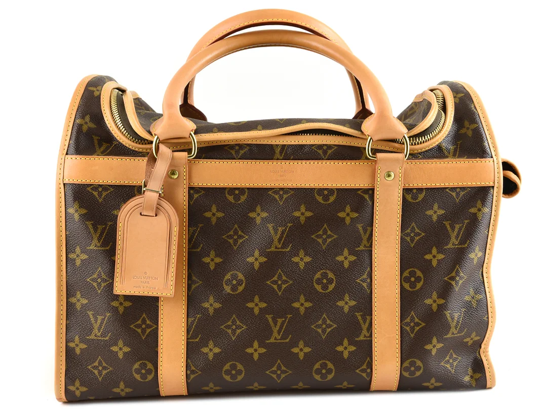 BAG, LOUIS VUITTON, Sac Chien 40, monogram canvas, 40x30x22 cm, skada på "gallret" — Accessoarer/Väskor — Kaplans