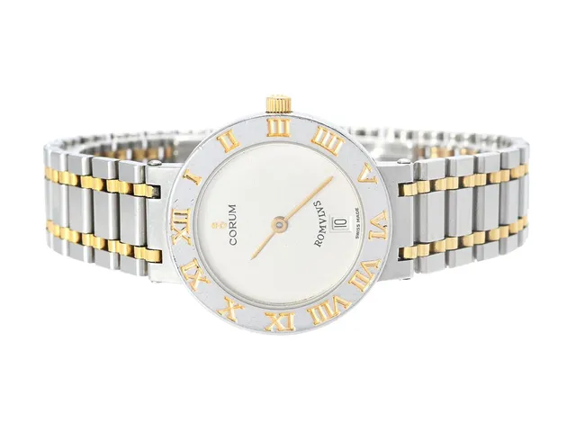 CORUM, Romvlvs, Verk nr. 270697, Serie nr. 533981, Boett nr. 533.981 / 49.203.21 V-48, damur, 26,5 mm, stål/guld, quartz, safirglas (repor/nagg), skadad urtavla, urverk ej signerat, integrerad originallänk, viklås, längd 170 mm, ca 1995.