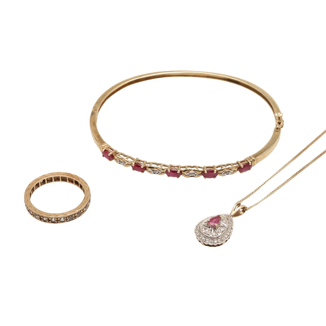 A 9CT GOLD, RUBY AND DIAMOND BANGLE, PENDANT ETC. — Bracelets — Lawrences Auctioneers