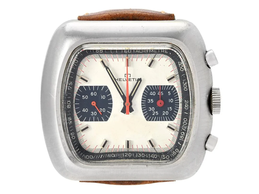 HELVETIA, Speedtimer, Cal 7733, Boett nr. 77300, kronograf, herrur, 42 x 39 mm, stål, manuell, plexiglas, skadad urtavla/visare, läderband, ca 1970. — Klockor/Helvetia — Kaplans