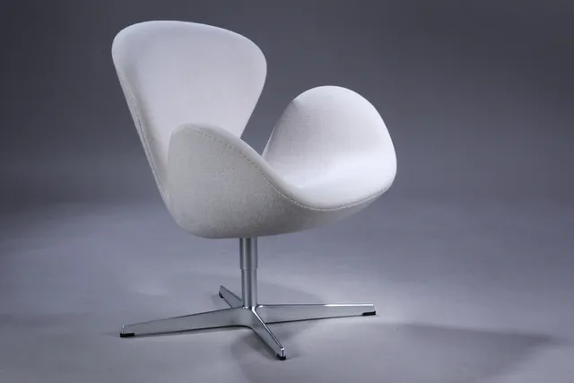 Arne Jacobsen. The Swan. Lounge chair, model 3320, 'Brown Label' 2011, tan-coloured ‘Hallingdal uld'.