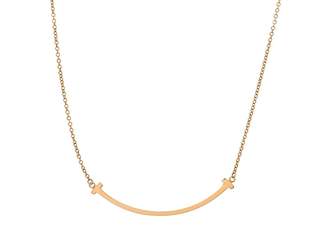 TIFFANY & CO, collier, Tiffany T Smile pendant, 18K guld, längd 41-46 cm, vikt 2,8 g, originaletui. — Smycken/Collier — Kaplans