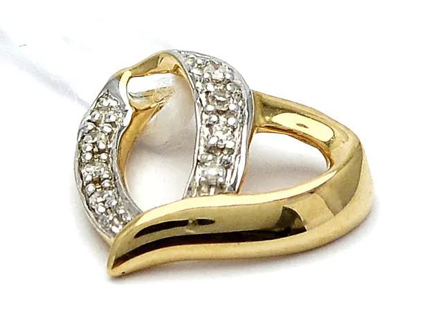 Hänge 18K 0,6g med åttkantslipade diamanter 7xca0,005ct