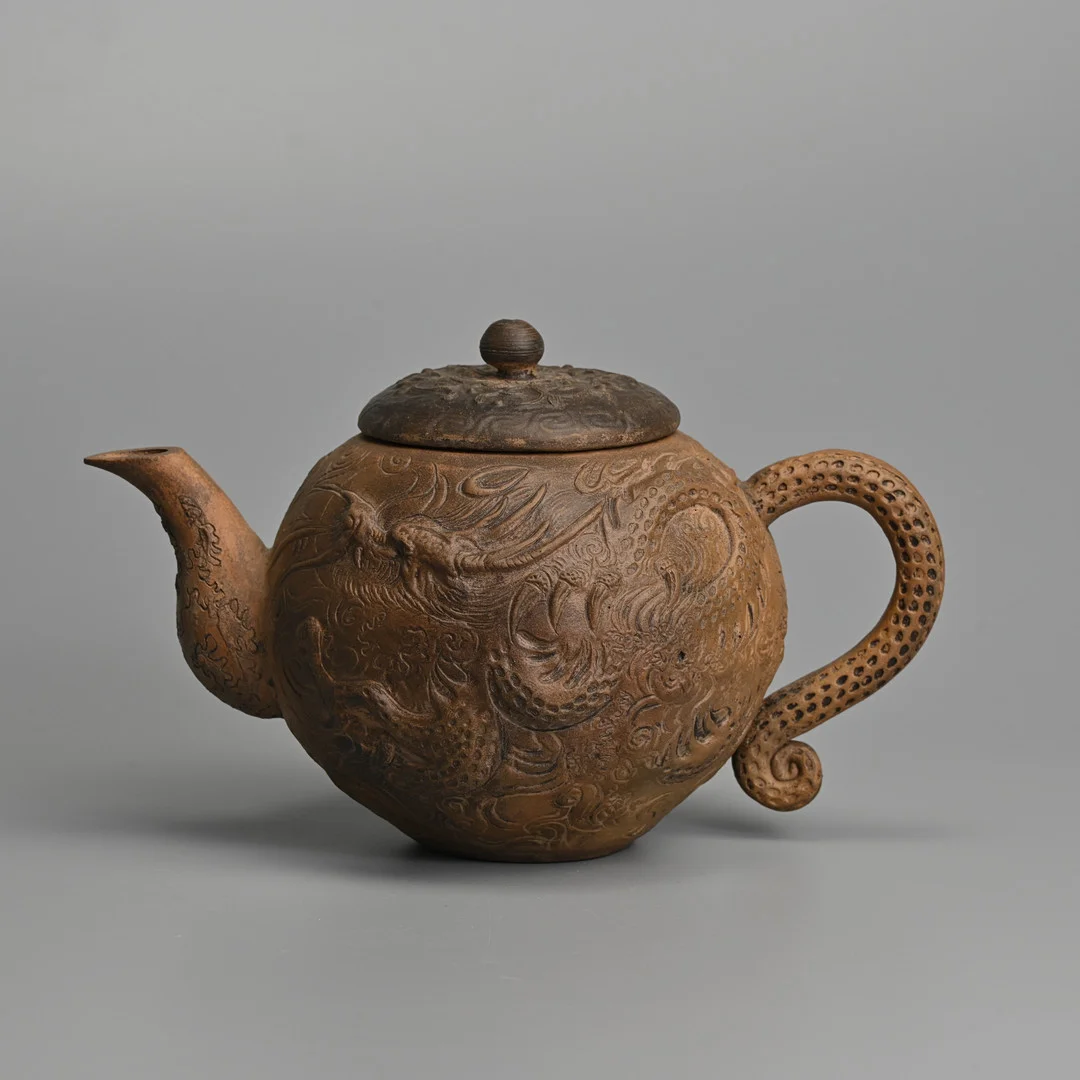 A CARVED CHINESE YIXING POTTERY 'DRAGON' TEA POT, 20TH CENTURY. — Ceramics & Porcelain — Ma San Auction
