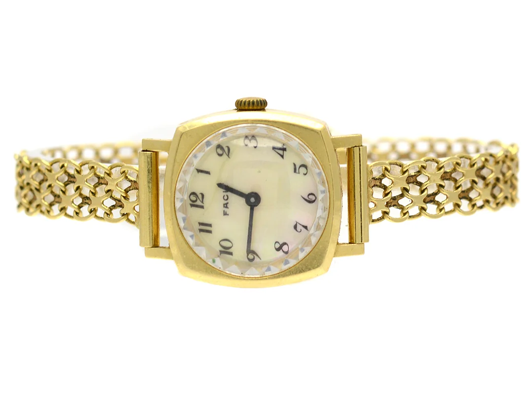 Damur Facit 18K manuell med armabnd X-länk 18K 18cm Brv 21,3g — Klockor/Facit — Kaplans