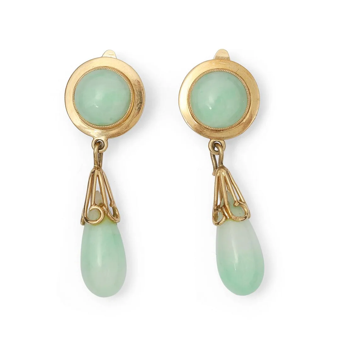 A pair of jade ear clips each set with a cabochon jadeite jade, mounted in 14k gold. Weight in total app. 12 g. L. 4.5 cm. (2) — Jewellery/Earrings — Bruun Rasmussen