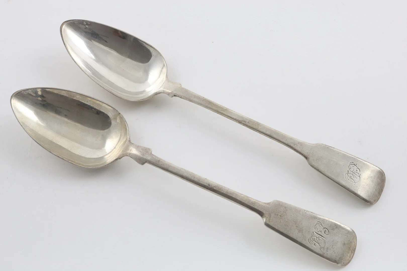 A PAIR OF GEORGE III/IV SCOTTISH PROVINCIAL TABLESPOONS. — Silver — Lawrences Auctioneers