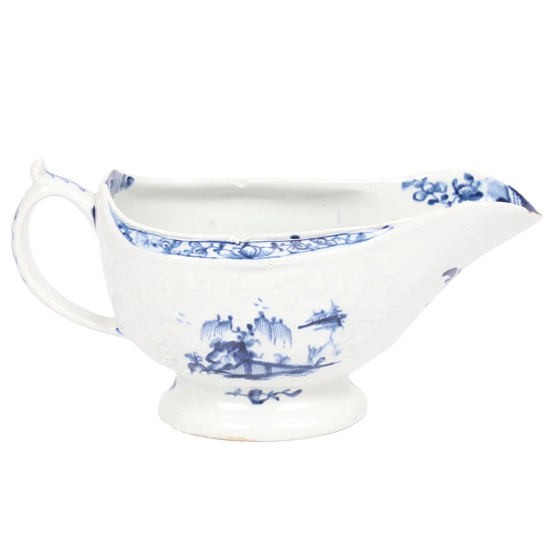 A LOWESTOFT PORCELAIN SAUCEBOAT. — European — Bishop & Miller