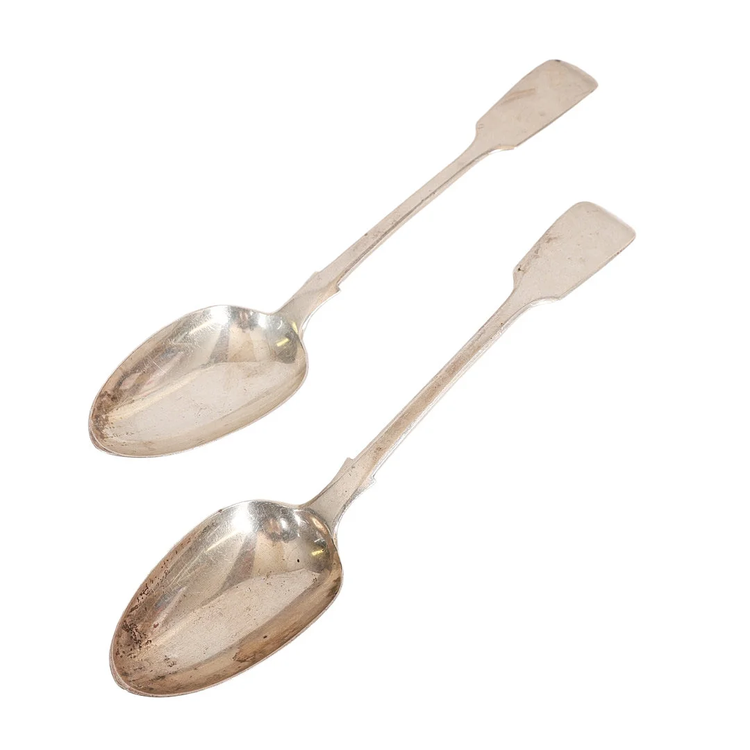 A PAIR OF VICTORIAN SILVER SERVING SPOONS (2). — Silver — Bishop & Miller