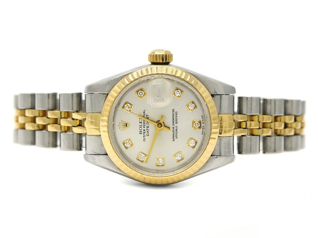 ROLEX, Oyster Perpetual, Datejust, Chronometer, Ref nr. 69173, Serie nr. 92x7243, Cal 2135, Verk nr. 0627044, Boett nr. 69000A, damur, 26 mm, stål/guld, automatisk, safirglas (skadat), datum, diamanturtavla (10 st, 8/8), skadad urtavla, defekt, Jubileelänk (ca 2000, skadad), viklås, Ref nr. 62523D-18-AB10/468 B, ca 1986. — Klockor/Rolex — Kaplans